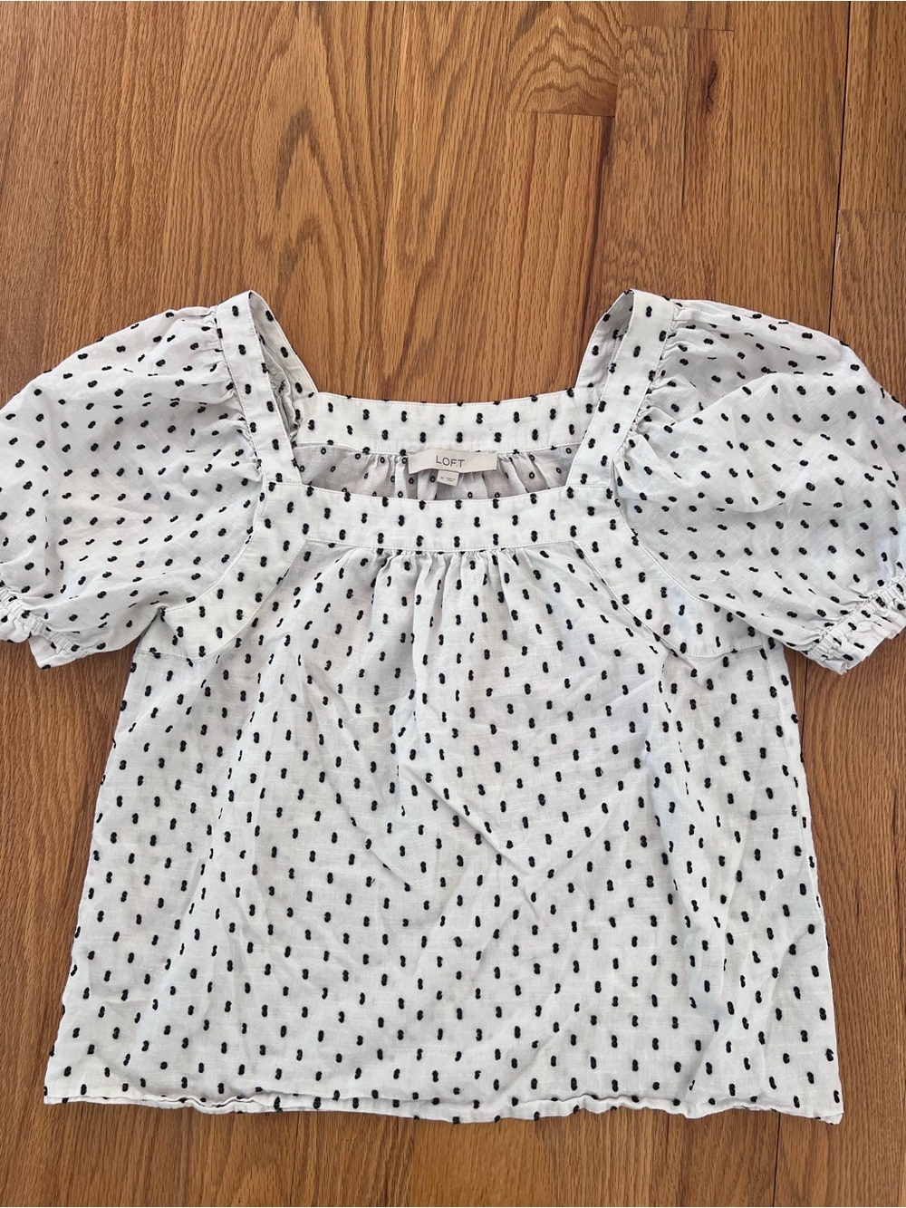 Loft cotton blouse features a black polka dot pattern and puff